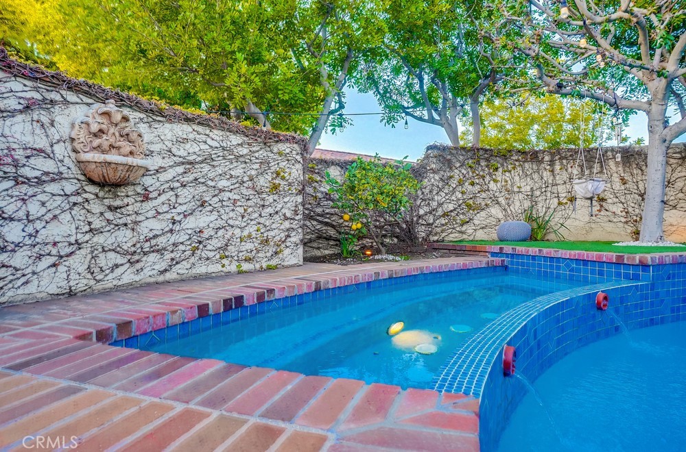 615 Edith Way Long Beach, CA 90807 - Photo 11 of 65 a view of swimming pool with seating space