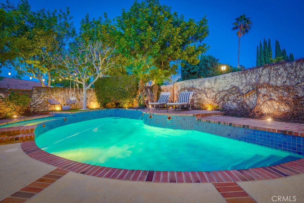 615 Edith Way Long Beach, CA 90807 - Photo 13 of 65 a view of a swimming pool with an outdoor seating