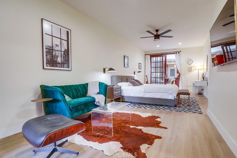 615 Edith Way Long Beach, CA 90807 - Photo 22 of 65 a bedroom with furniture and a window