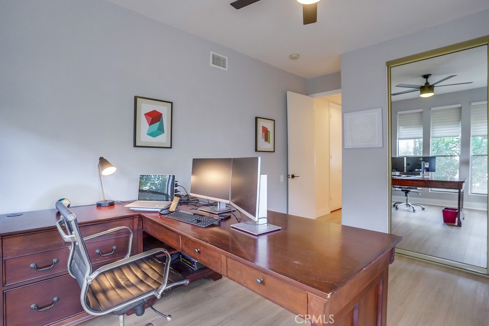 615 Edith Way Long Beach, CA 90807 - Photo 24 of 65 a room with furniture and a flat screen tv