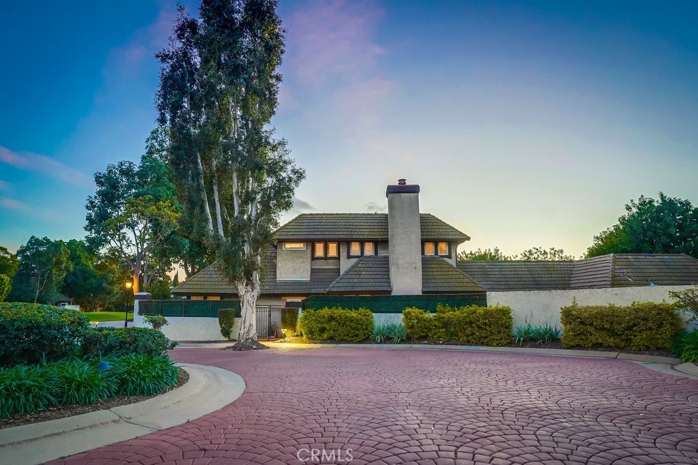 615 Edith Way Long Beach, CA 90807 - Photo 3 of 65 a front view of a house with a yard and a garden