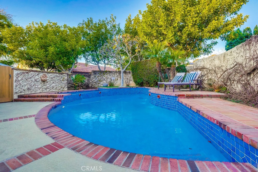 615 Edith Way Long Beach, CA 90807 - Photo 34 of 65 a view of swimming pool with seating space