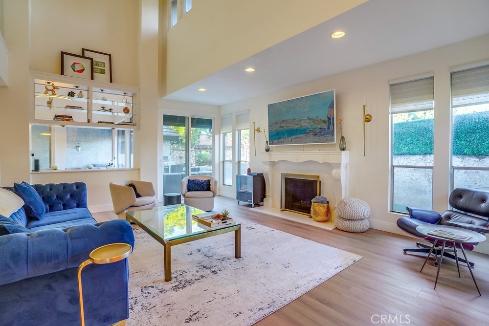 615 Edith Way Long Beach, CA 90807 - Photo 39 of 65 a living room with furniture fireplace and window