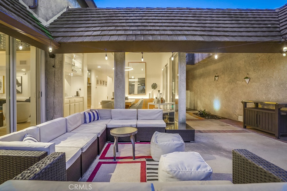 615 Edith Way Long Beach, CA 90807 - Photo 41 of 65 a living room with furniture and a large window
