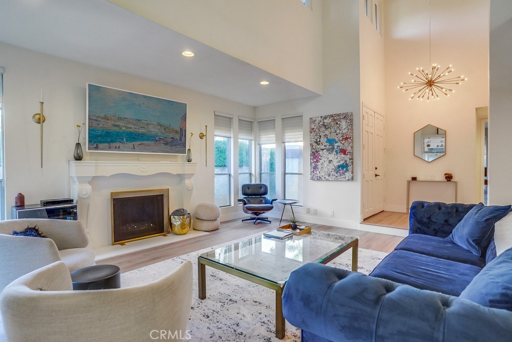 615 Edith Way Long Beach, CA 90807 - Photo 47 of 65 a living room with furniture fireplace and window