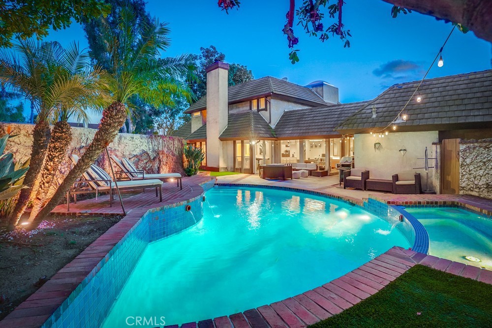 615 Edith Way Long Beach, CA 90807 - Photo 51 of 65 a view of a swimming pool with lounge chairs