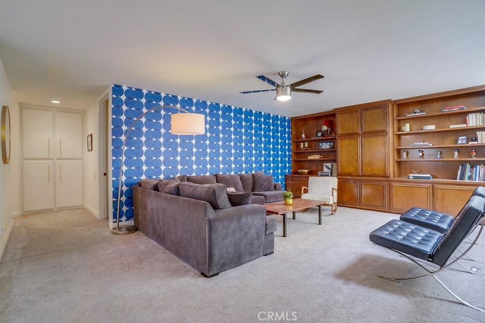 615 Edith Way Long Beach, CA 90807 - Photo 10 of 65 a living room with furniture and a ceiling fan