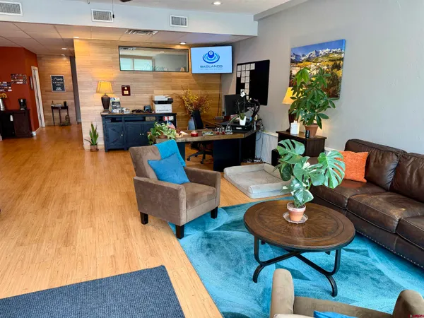 a living room with furniture and a table