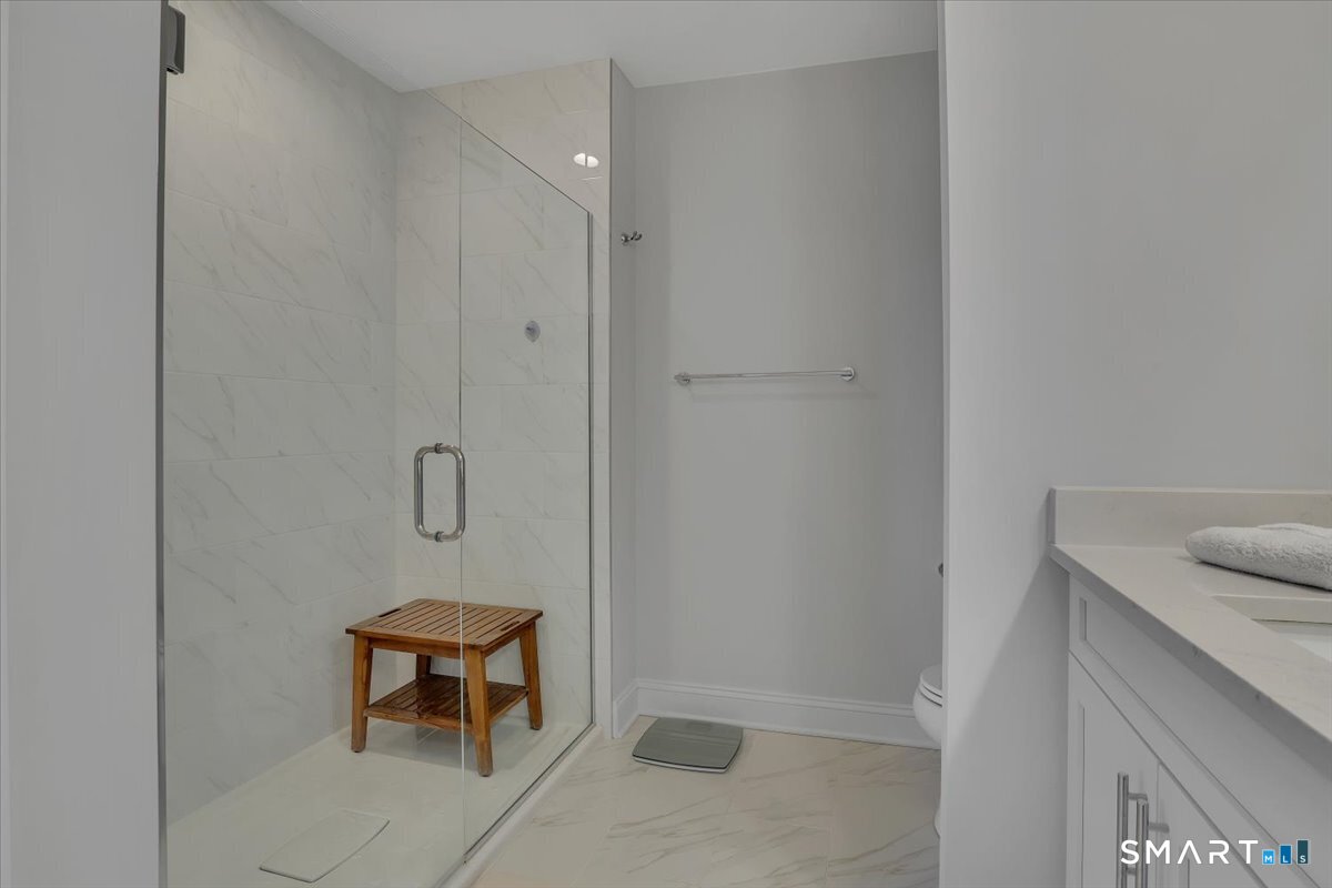 8 Soderman Way, Unit 8 Cheshire, CT 06410 - Photo 17 of 27 a bathroom with a shower