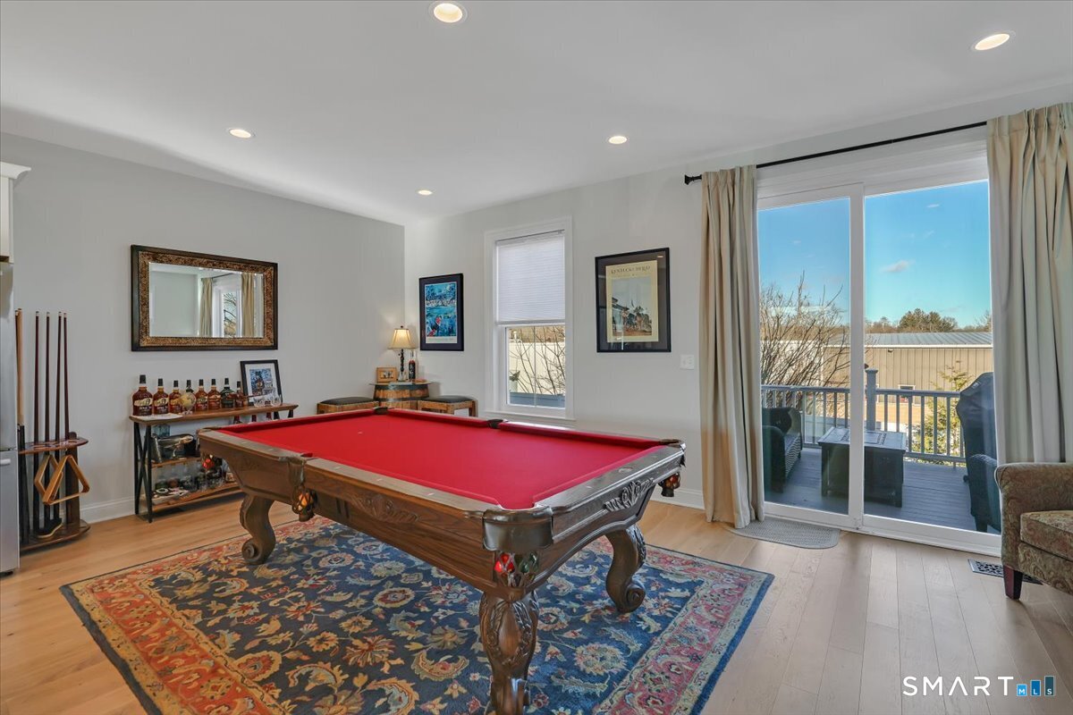 8 Soderman Way, Unit 8 Cheshire, CT 06410 - Photo 8 of 27 a dinning room with a rug table and chairs