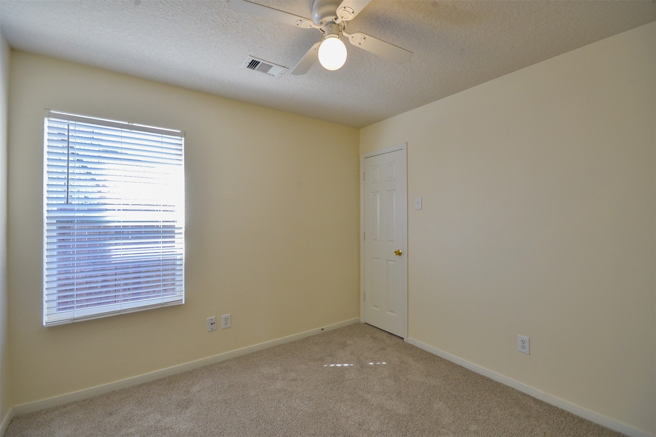 4819 Dappled Grove Trail Humble, TX 77346 - Photo 16 of 20 a view of an empty room with a window