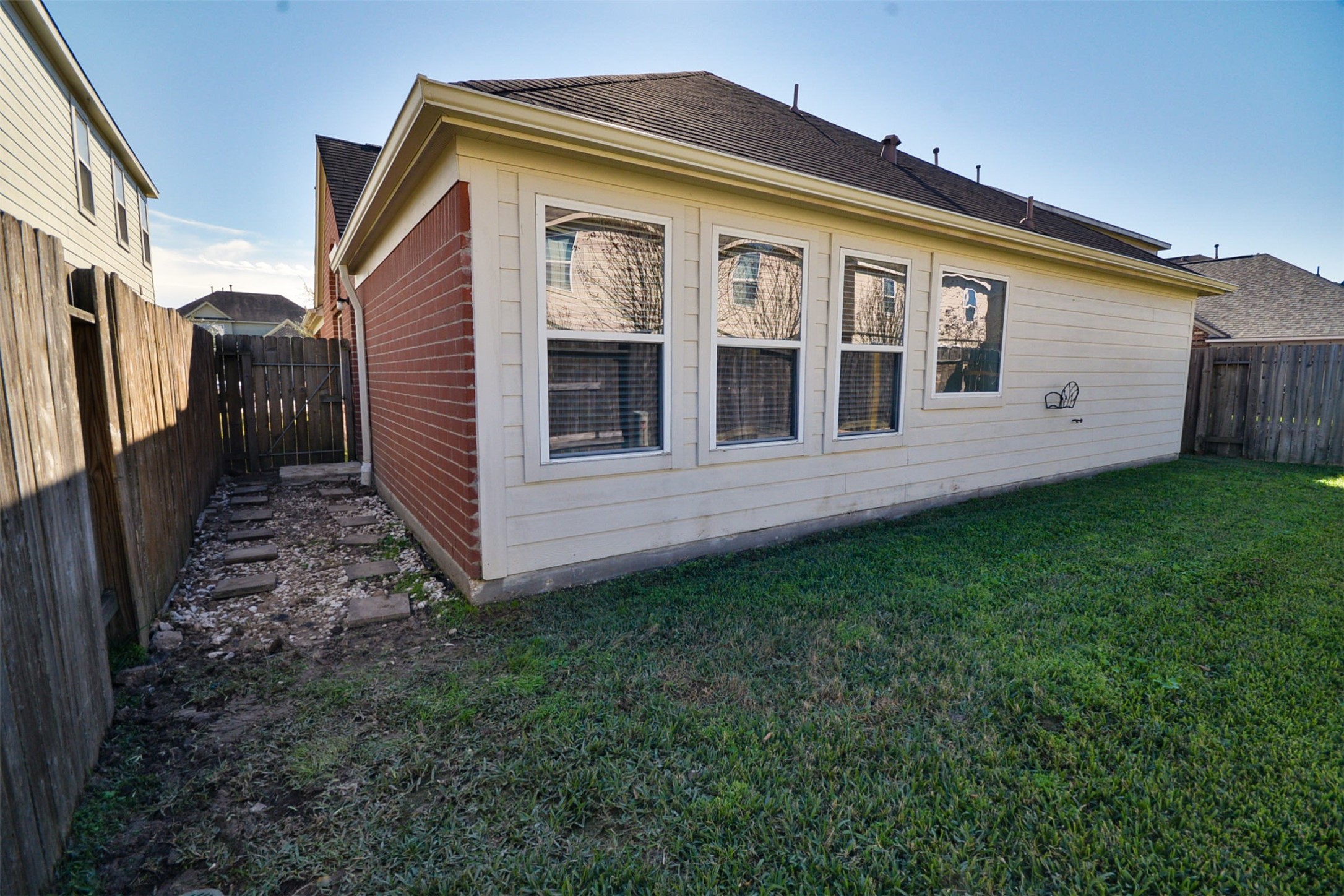 4819 Dappled Grove Trail Humble, TX 77346 - Photo 19 of 20 a view of a house with backyard and porch