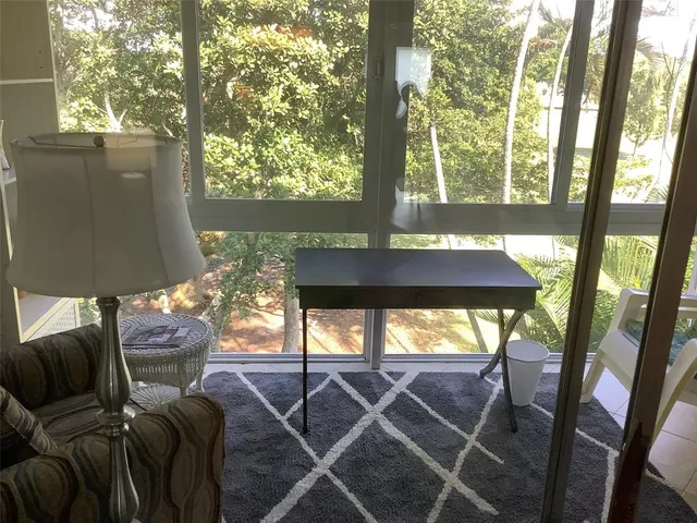 a room with furniture and a window