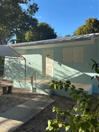 a view of a backyard with plants