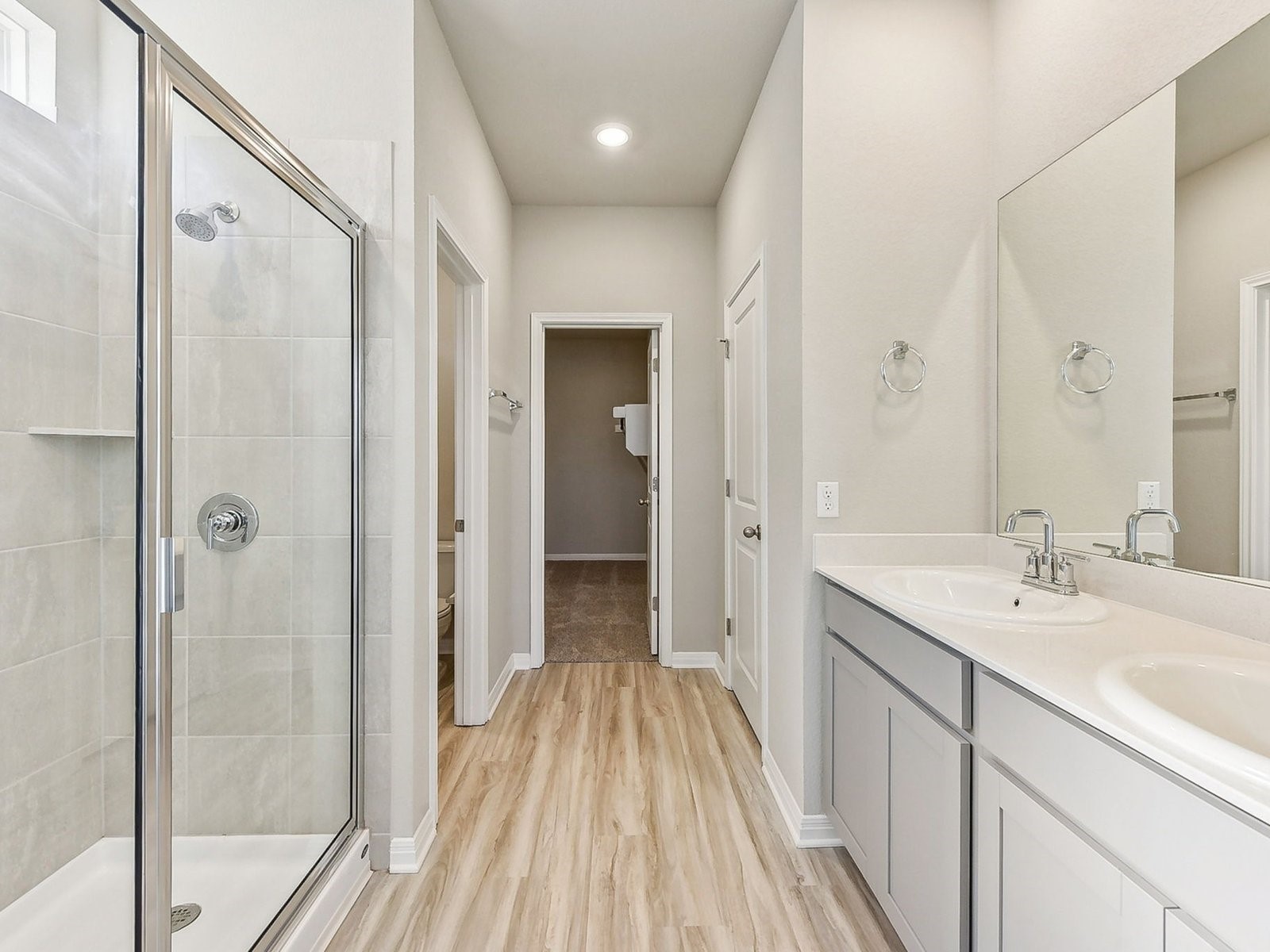 22631 Ellis Way New Caney, TX 77357 - Photo 5 of 13 a bathroom with a sink and a mirror