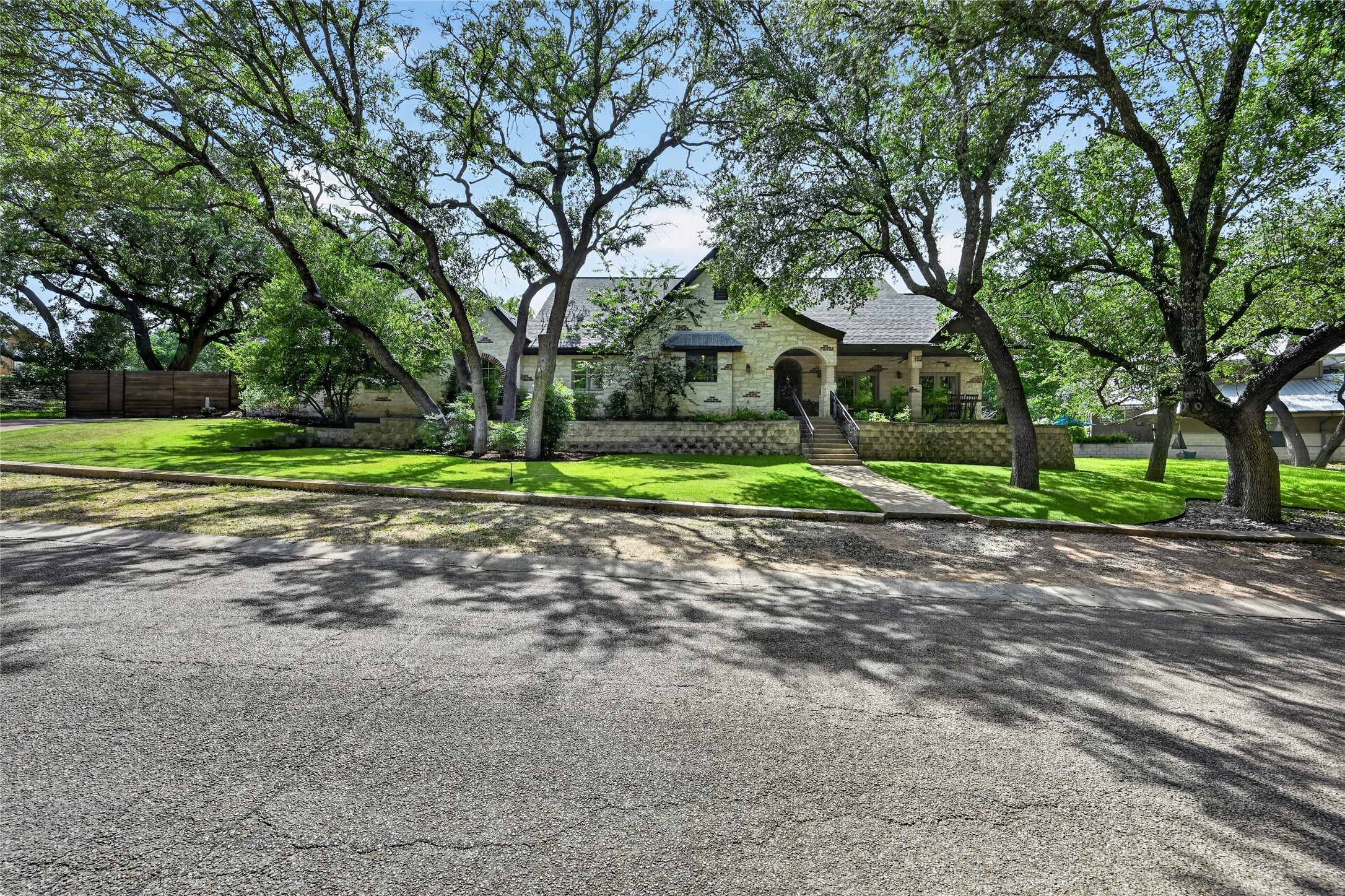700 Willow Creek Road Salado, TX 76571 - Photo 11 of 39 Situated on street filled with mature trees, this home makes a statement.