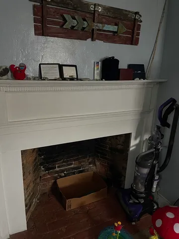 a living room with a couch and a table in it