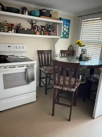 a bathroom with a toilet and a bathtub