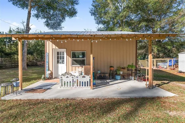 an aerial view of a city and lake view