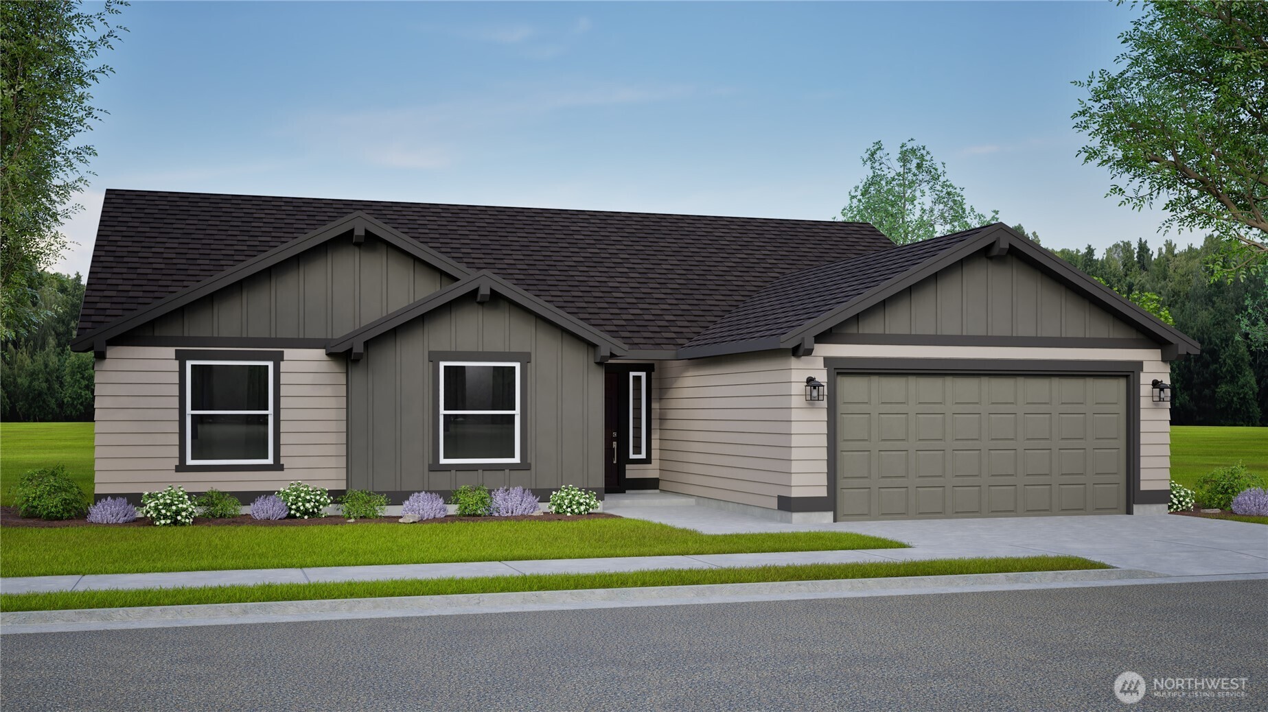 a front view of a house with a yard and garage