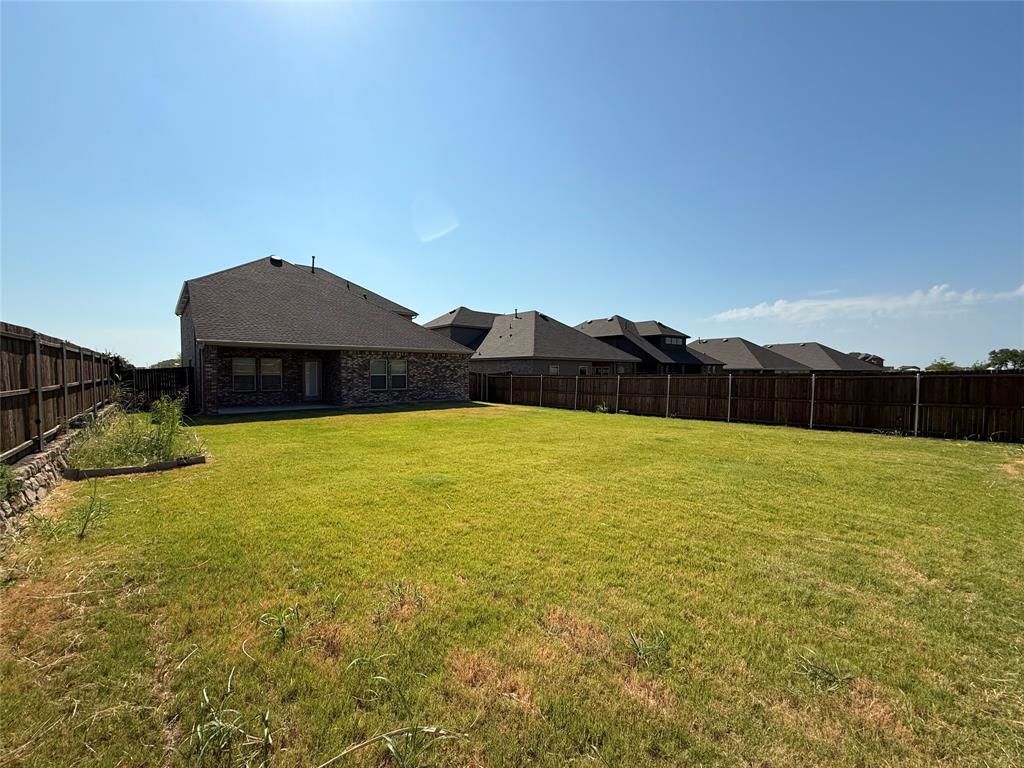 1400 Colonial Bluff Lane Princeton, TX 75407 - Photo 26 of 27 a view of a large pool with an outdoor space and seating area