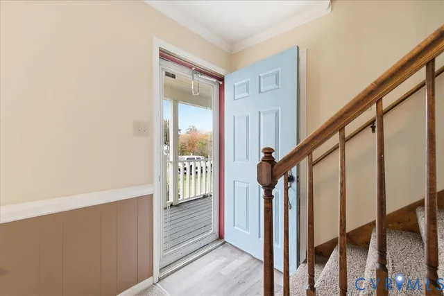 a view of an entryway with staircase