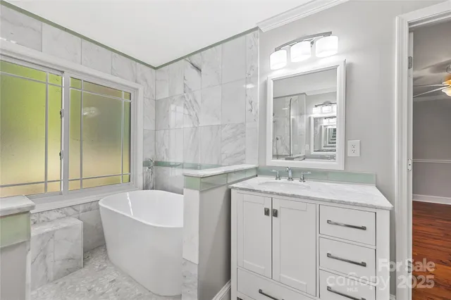 a bathroom with a shower and a sink