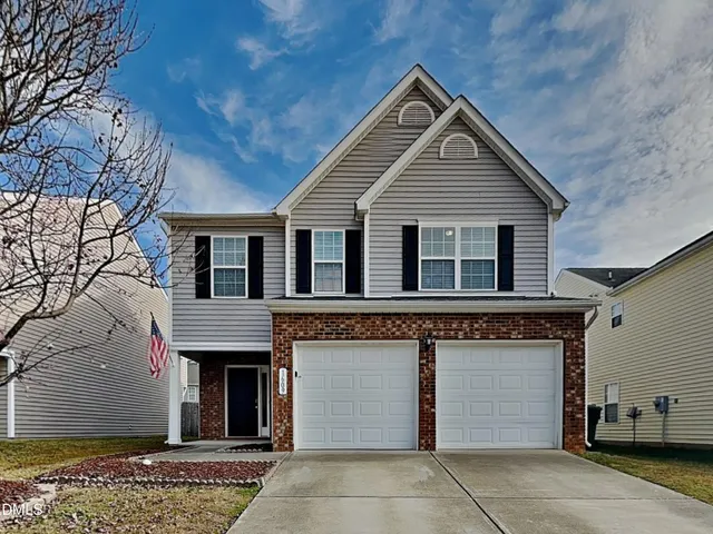 a view of house with outdoor space