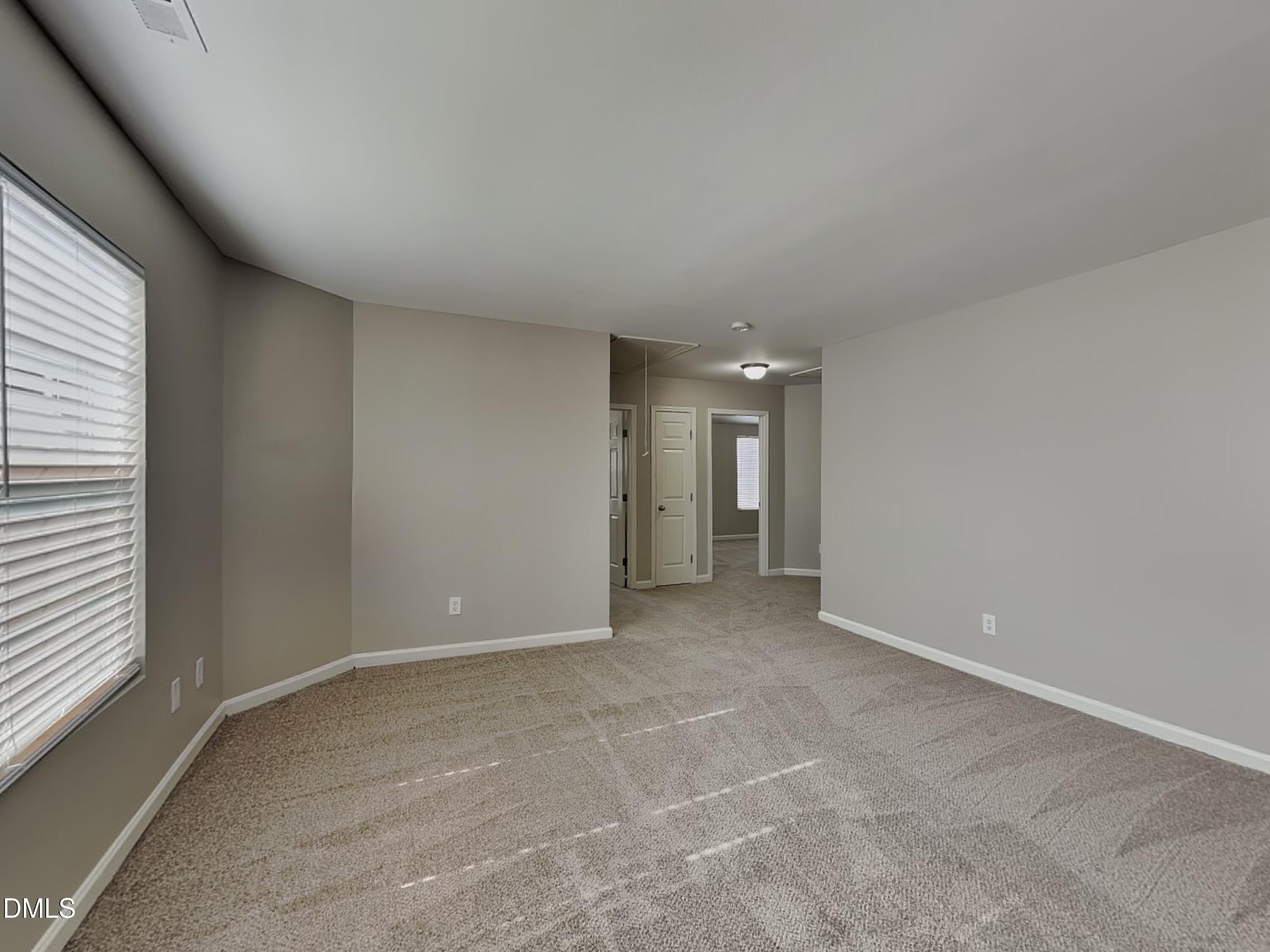 1609 Extine Lane Raleigh, NC 27610 - Photo 17 of 18 an empty room with an entryway