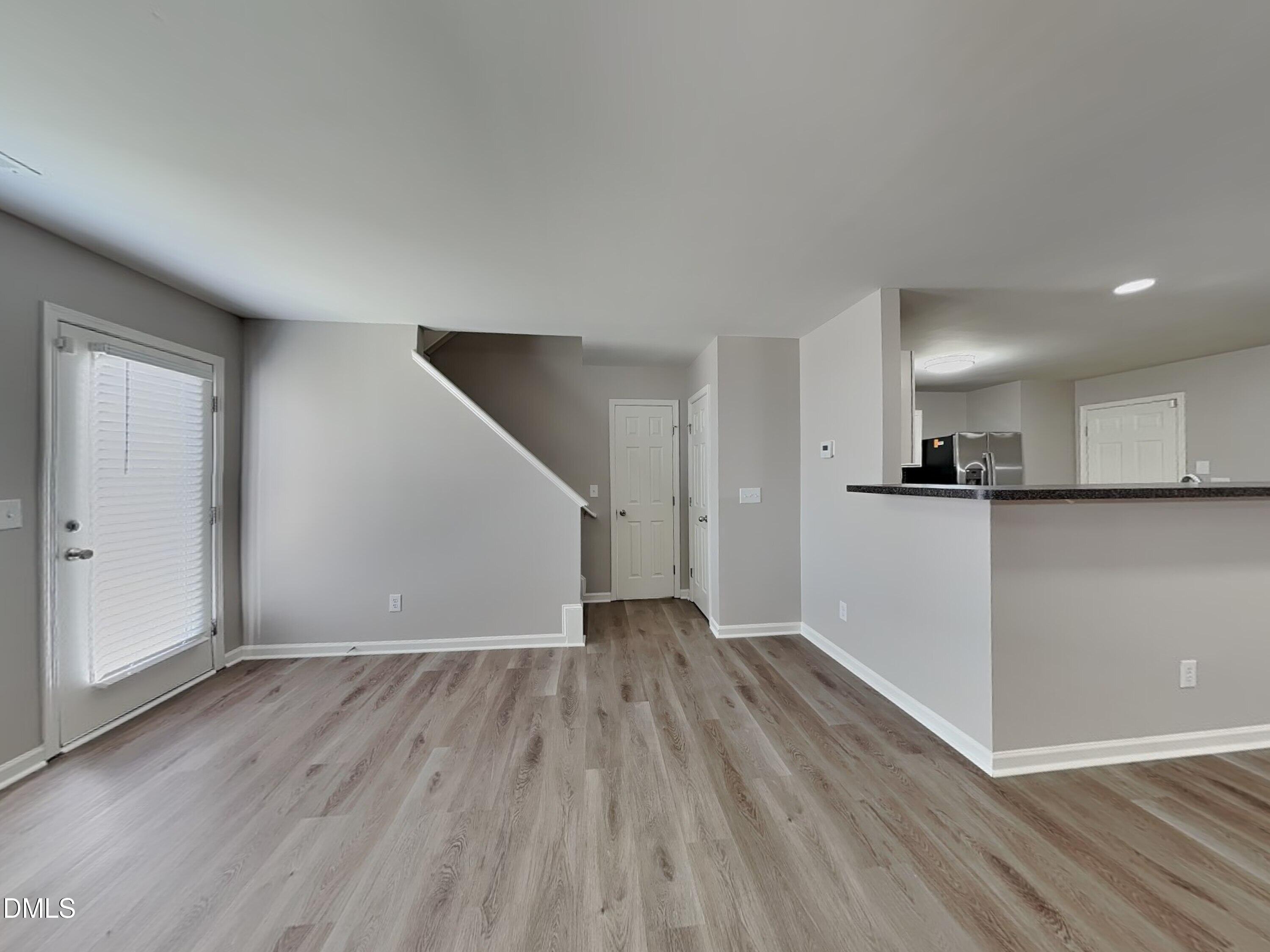 1609 Extine Lane Raleigh, NC 27610 - Photo 2 of 18 a view of kitchen with wooden floor
