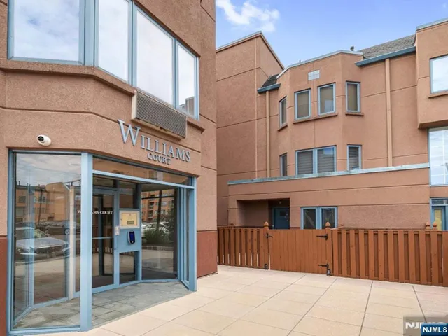 a view of a building with a door and a window