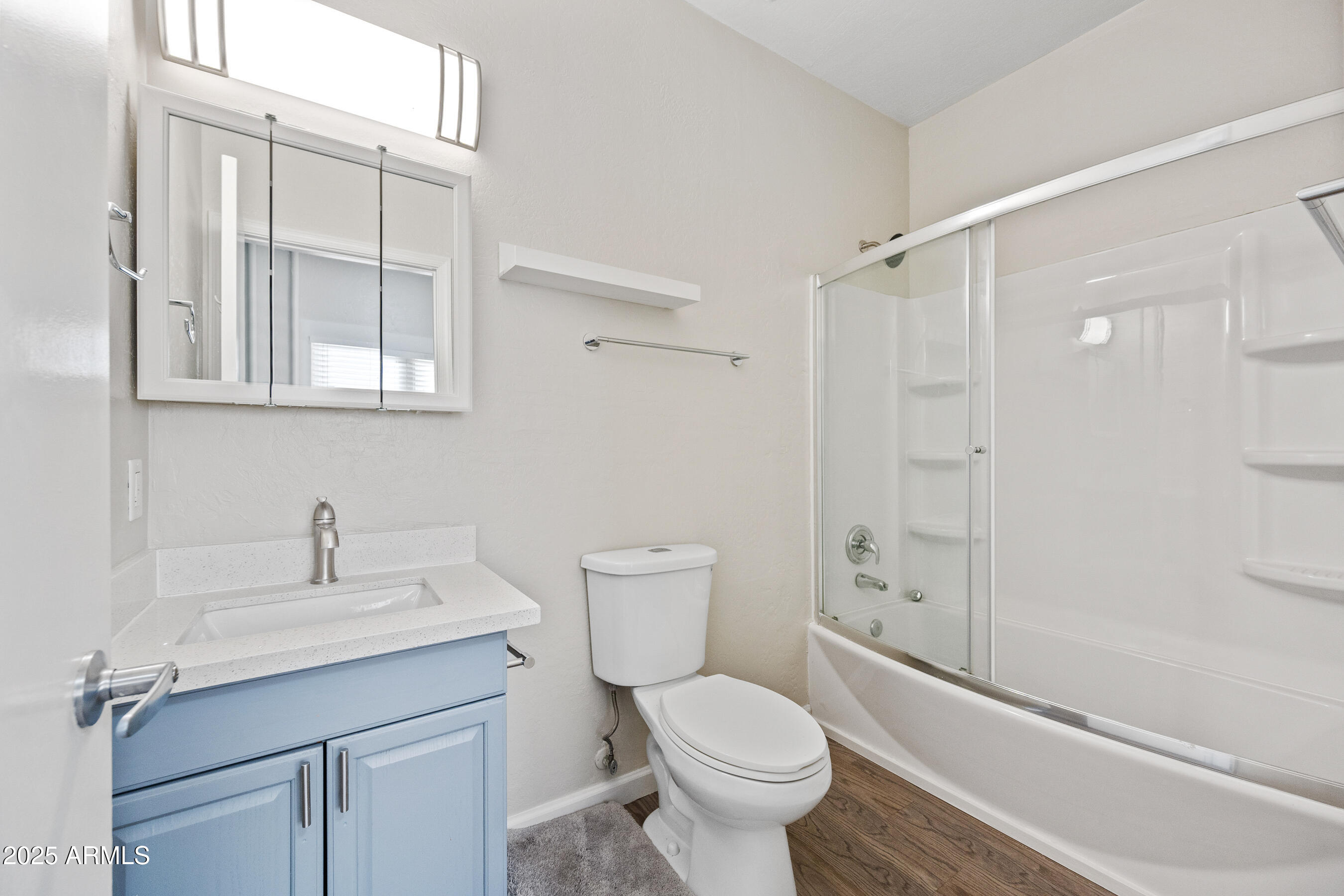 438 North 17th Avenue, Unit B Phoenix, AZ 85007 - Photo 10 of 19 a bathroom with a toilet a sink and a shower