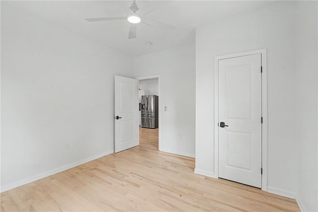 827 Elbert Street Southwest Atlanta, GA 30310 - Photo 12 of 33 a view of a room with wooden floor