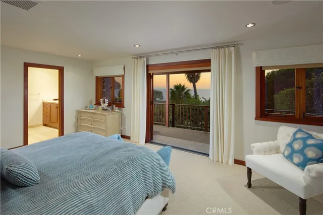 a bed room with a bed and a couch