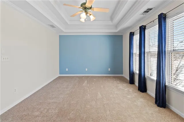 a bathroom with a double vanity sink toilet and shower
