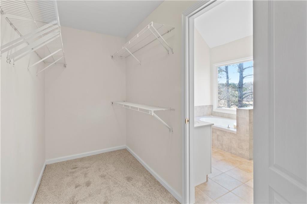 325 Morning Mist Walk Suwanee, GA 30024 - Photo 23 of 67 a view of an empty room