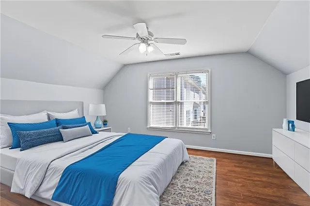 a view of a hallway with stairs