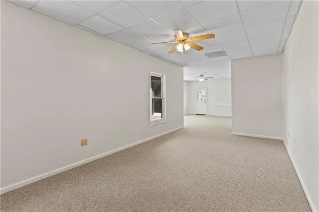 an aerial view of a house with a ocean view