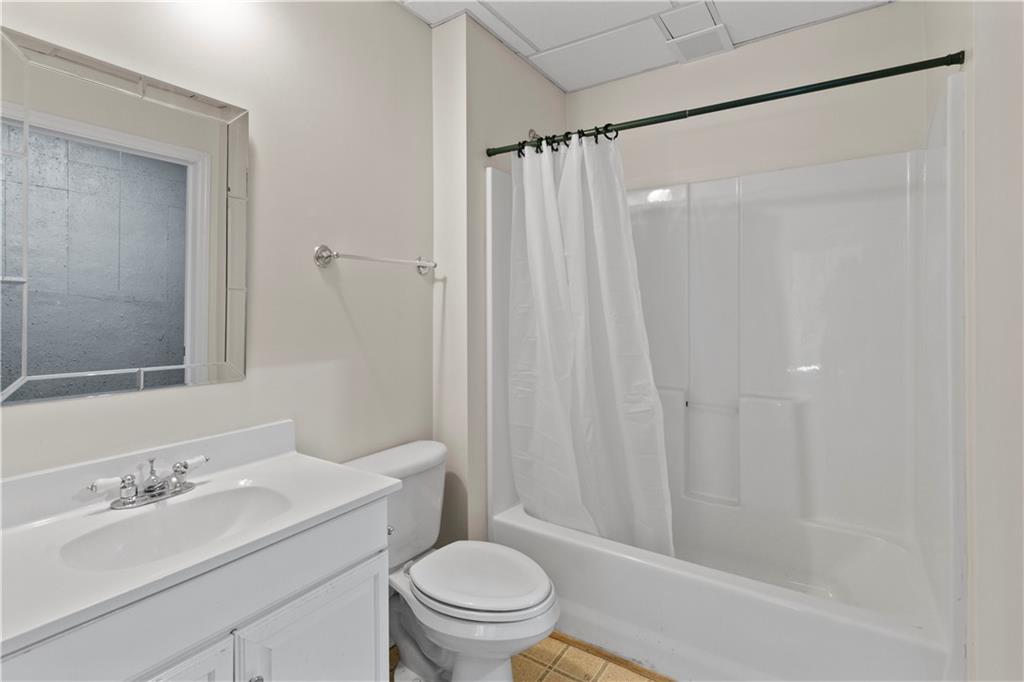 325 Morning Mist Walk Suwanee, GA 30024 - Photo 42 of 67 a bathroom with a sink a toilet and shower