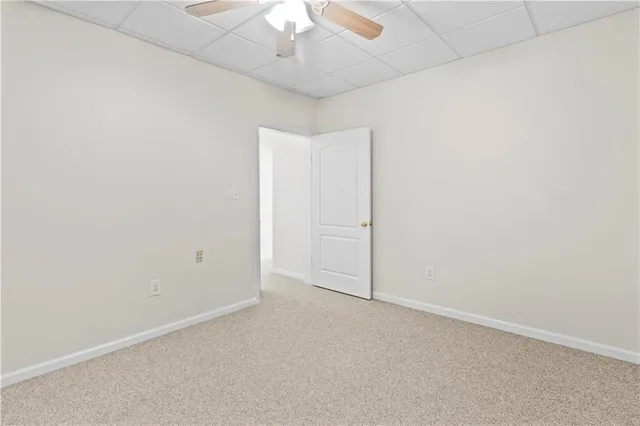 a view of lake with green space