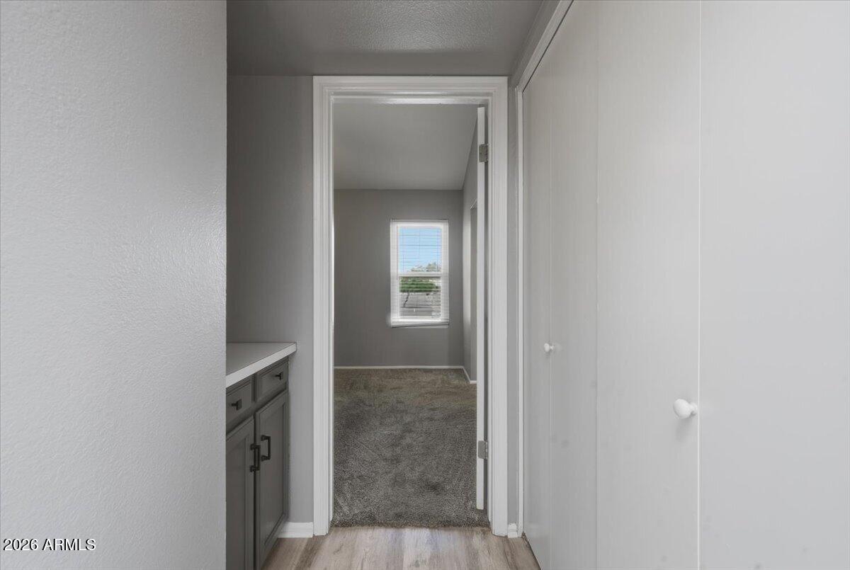 2834 South Ext Road, Unit 2010 Mesa, AZ 85210 - Photo 18 of 36 Hallway to Primary Suite