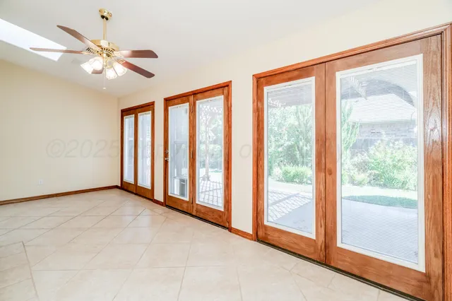 a bathroom with a bathtub and a window