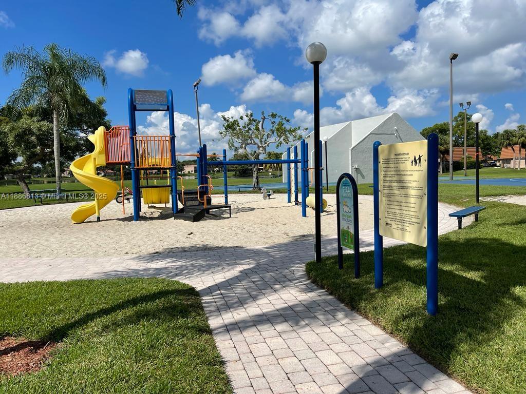 1683 Southwest 109th Terrace Davie, FL 33324 - Photo 11 of 45 a park with lots of green space and plants