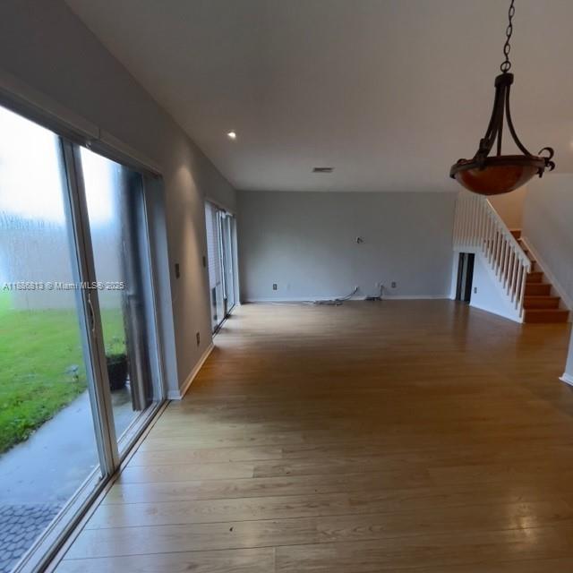 1683 Southwest 109th Terrace Davie, FL 33324 - Photo 18 of 45 a view of empty room with wooden floor