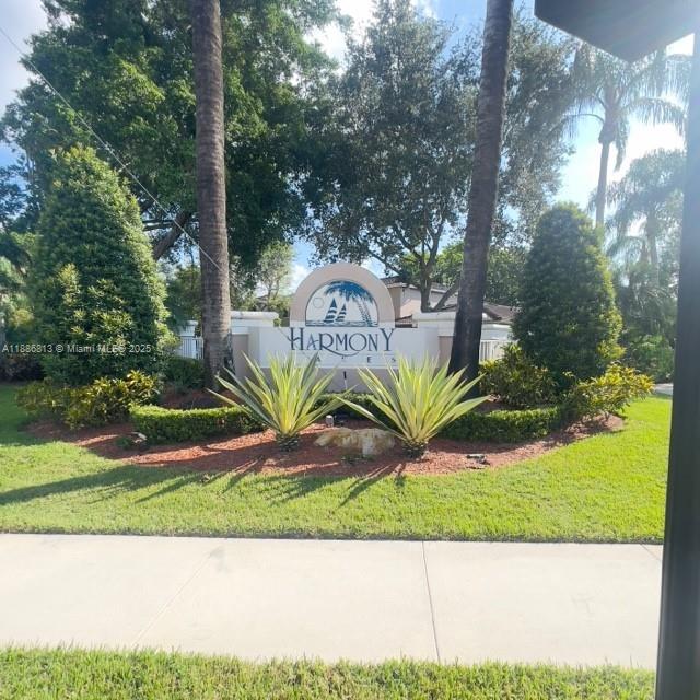 1683 Southwest 109th Terrace Davie, FL 33324 - Photo 2 of 45 a view of a swimming pool with a yard