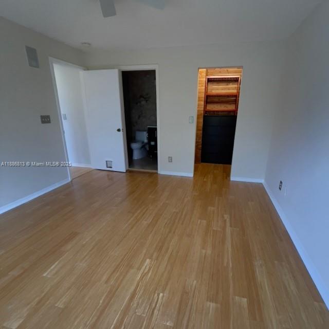 1683 Southwest 109th Terrace Davie, FL 33324 - Photo 29 of 45 a view of an empty room with wooden floor