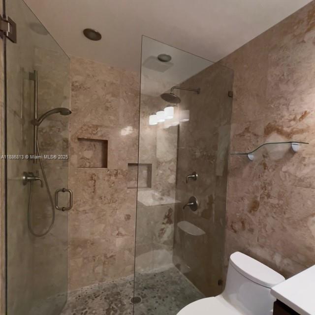 1683 Southwest 109th Terrace Davie, FL 33324 - Photo 34 of 45 a bathroom with a shower and toilet