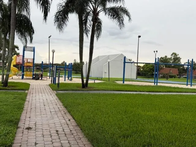 a park with lots of swings and slides