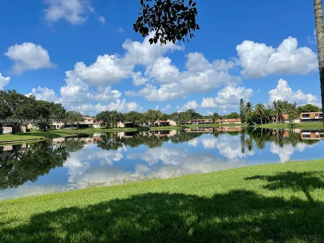 a view of a lake with houses