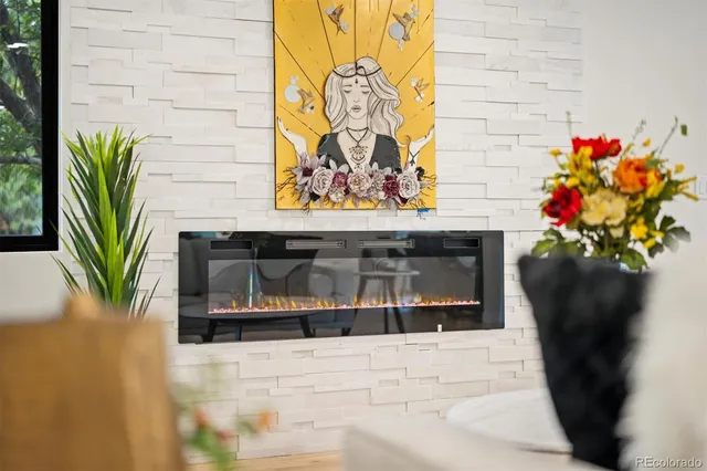 a potted plant sitting on the side of a brick wall